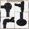 A collage of close-up shots of a black metal pipe storage rack, showing different connection points and mounting flanges. Produktbild-Vorschau