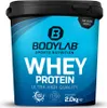 A product shot of a large tub of whey protein powder. Produktbild-Vorschau