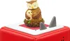 A close-up shot of a Tonies audio player with an owl figurine on top. Produktbild-Vorschau