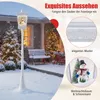 A snowy outdoor scene with a decorated Christmas tree and a festive street lamp. Produktbild-Vorschau