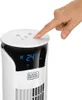 A person's hand is shown pressing a button on the top of a white tower fan. The fan has a digital display showing the temperature. Produktbild-Vorschau