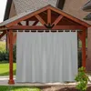 A gray outdoor curtain hanging from a wooden gazebo in a backyard setting. Produktbild-Vorschau
