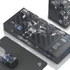 A product shot of a gaming keyboard and mouse set packaging, along with a mousepad and a smaller box, likely for a gaming mouse. Produktbild-Vorschau