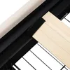 A close-up view of a bed frame's slatted base with velcro strips and a wooden slat. Náhled obrázku produktu