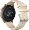 The back of a smartwatch with a cream-colored band is shown against a white background. Náhled obrázku produktu