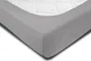A close-up view of a grey fitted sheet on a mattress. Produktbild-Vorschau