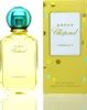 A perfume bottle and its packaging are displayed side-by-side against a white background. Voir les images du produit