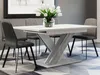 A dining table with chairs in a modern dining room setting. Anteprima dell’immagine prodotto