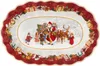 An oval serving platter with a Christmas scene featuring Santa Claus, reindeer, and children, surrounded by a border of gift boxes. Produktbild-Vorschau