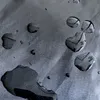Water droplets on a textured black surface. Náhľad obrázku produktu