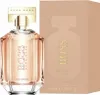 A perfume bottle and its packaging are displayed against a white background. Voir les images du produit