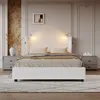 A bedroom scene featuring a bed, nightstands, and decor. Náhľad obrázku produktu
