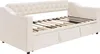A beige upholstered daybed with a tufted headboard and integrated storage drawers is shown from a side angle. Anteprima dell’immagine prodotto