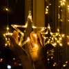 Hands holding a star-shaped string light with other lights in the background. Produktbild-Vorschau