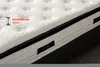 Close-up view of a mattress edge, showing its height and texture. Produktbild-Vorschau