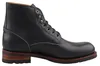 Auf dem Bild ist ein schwarzer Stiefel abgebildet der von der Seite betrachtet wird. Der Stiefel hat ein schlichtes Design mit einer hochgezogenen Vorderkappe und einer robusten Sohle. Produktbild-Vorschau