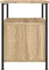 A side view of a wooden nightstand with black metal legs. Náhled obrázku produktu