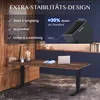 A desk setup with a standing desk, lamp, and laptop, with marketing text overlay. Anteprima dell’immagine prodotto