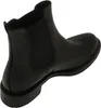 A black Chelsea boot is shown from a side-angle against a white background. Voir les images du produit