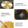 A collage of images showcasing different features of a wall clock, including its metallic dial, silent movement mechanism, and hanging hook. Produktbild-Vorschau