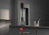 A modern kitchen counter with a sleek water carbonator and accessories. Produktbild-Vorschau