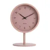 A pink Karlsson table clock on a white background. Náhled obrázku produktu