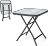 A square glass-top folding table with a black metal frame, shown both set up and folded. Produktbild-Vorschau