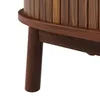 A close-up view of the wooden leg and base of a piece of furniture. Podgląd zdjęcia produktu