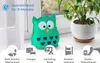 A green owl-shaped dehumidifier sits on a windowsill next to a potted plant, with various icons and text indicating its uses and duration. Produktbild-Vorschau