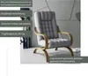 A gray armchair with a wooden frame is shown in a modern interior setting. Podgląd zdjęcia produktu