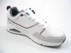 A single white sneaker with gray and maroon accents is shown against a white background. Voir les images du produit