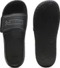 A pair of black PUMA slide sandals, shown from the top and the sole. Produktbild-Vorschau