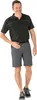 A man is standing and posing for a product photo. Produktbild-Vorschau