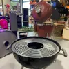 A retail store setting with various grilling accessories on display. Produktbild-Vorschau