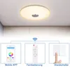A diagram showing a ceiling light with three control methods: mobile app, remote control, and wall switch. Voir les images du produit