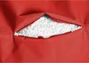 A close-up view of a red beanbag chair with its zipper partially open, revealing the white filling inside. Produktbild-Vorschau