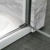 Close-up of the corner of a shower cabin, showing the frame and glass meeting at a right angle. Produktbild-Vorschau