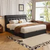 A bedroom scene with a bed, rug, and window. Náhľad obrázku produktu
