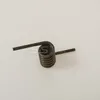 A metal spring on a white background. Produktbild-Vorschau