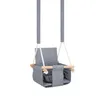 A baby swing is shown hanging against a white background. Produktbild-Vorschau