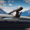 Close-up of a car roof rack system against a blurred mountain and sky background. Produktbild-Vorschau