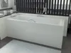 A white bathtub with chrome fixtures is shown in a modern bathroom setting. Podgląd zdjęcia produktu