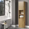 A modern bathroom with a freestanding bathtub, shower, and a tall wooden cabinet. Produktbild-Vorschau
