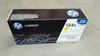 A product box for an HP toner cartridge is shown on a gray surface. Náhľad obrázku produktu