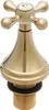 A close-up studio shot of a gold-colored faucet handle and base. Podgląd zdjęcia produktu