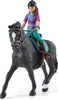 A toy figurine of a girl riding a black horse. Náhľad obrázku produktu