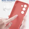 A hand is touching a red phone case, highlighting its matte surface and soft grip. Produktbild-Vorschau