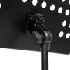 A close-up of the adjustable joint mechanism on a black metal music stand. Produktbild-Vorschau