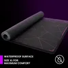 A rolled-up mousepad is shown partially unrolled on a dark background. Anteprima dell’immagine prodotto