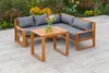 An outdoor patio setting with a sectional sofa and coffee table. Produktbild-Vorschau